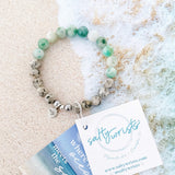 Aqua tides or beachy blues with sandy jaspers